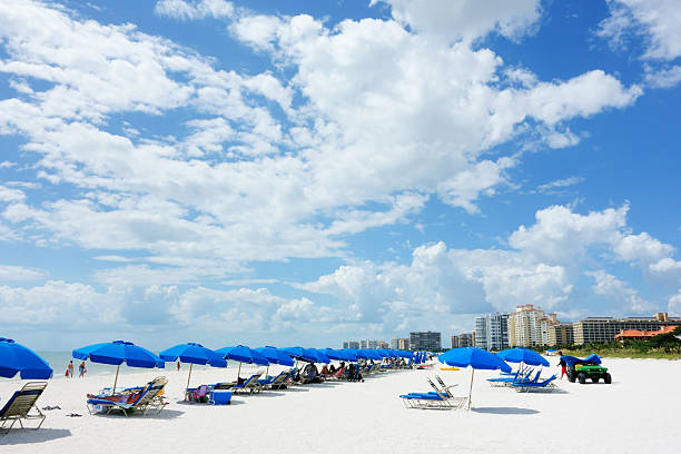 Blue beach umbrellas on Marco Island
